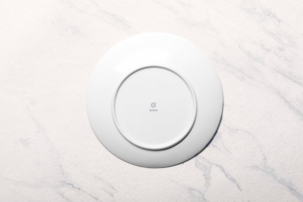 Ariane 10 5/8" Lir Porcelain Coupe Elevated Plate - 12/Case (AVCARND65111027) - iFoodservice Online