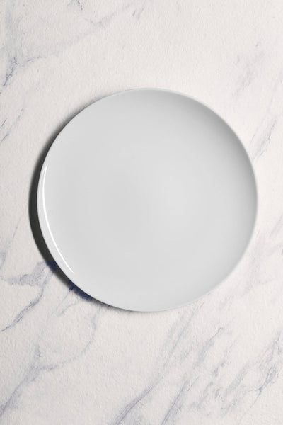 Ariane 11 3/7" Vital Coupe - Warm White Porcelain Coupe Elevated Plate - 6/Case (AVCARN000111029) - iFoodservice Online