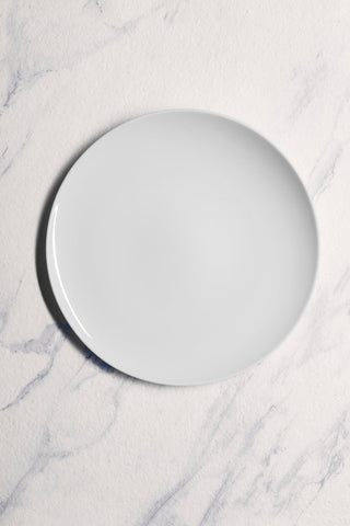 Ariane 11 3/7" Vital Coupe - Warm White Porcelain Coupe Elevated Plate - 6/Case (AVCARN000111029) - iFoodservice Online