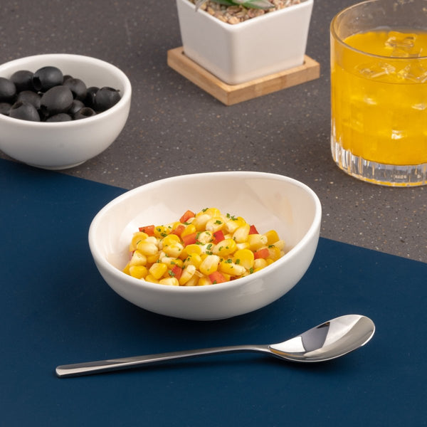 Ariane 4 5/7" Vital Coupe - Warm White Porcelain Coupe Bowl - 12/Case (AVCARN000022012) - iFoodservice Online