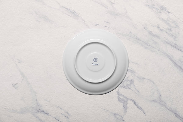 Ariane 5 1/8" Vital Coupe - Warm White Porcelain Coupe Round Rimless Espresso Saucer - 12/Case (AVCARN000014001) - iFoodservice Online