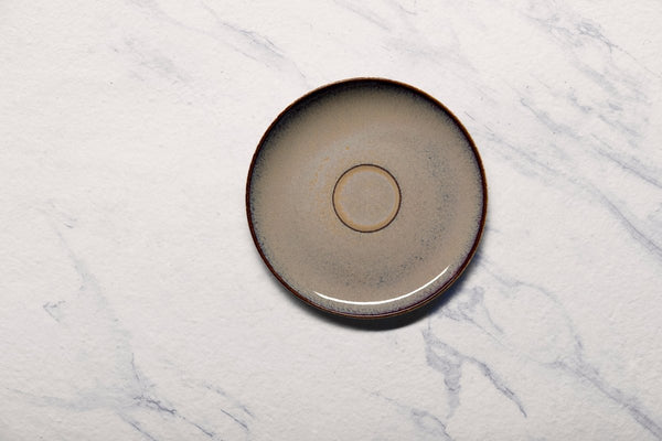 Ariane 6 2/7" Splash Beige Porcelain Coupe Elevated Tea/Coffee Saucer - 12/Case (AVCARN257014016) - iFoodservice Online