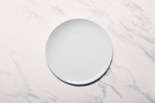 Ariane 9 4/9" Vital Coupe - Warm White Porcelain Coupe Elevated Plate - 12/Case (AVCARN000111024) - iFoodservice Online