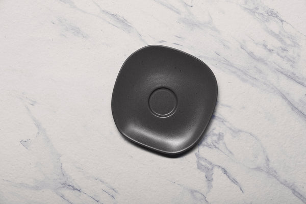 Ariane Earth 5 1/8" Earth - Charcoal Grey Dots Porcelain Saucer - 12/Case (AERARN510014013) - iFoodservice Online