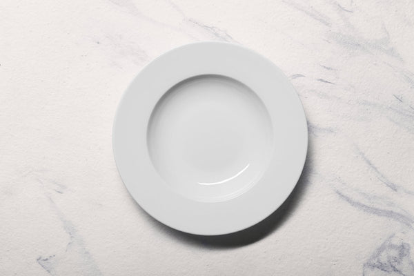 Ariane Prime 10 1/4" Prime - Warm White Porcelain Deep Plate - 6/Case (APRARN000012026) - iFoodservice Online
