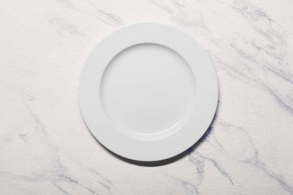 Ariane Prime 10 5/8" White Eclipse Porcelain Flat Plate - 12/Case (APRARN120011027) - iFoodservice Online