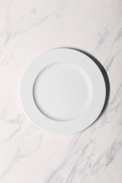 Ariane Prime 10 5/8" White Orba Porcelain Flat Plate - 12/Case (APRARN121011027) - iFoodservice Online