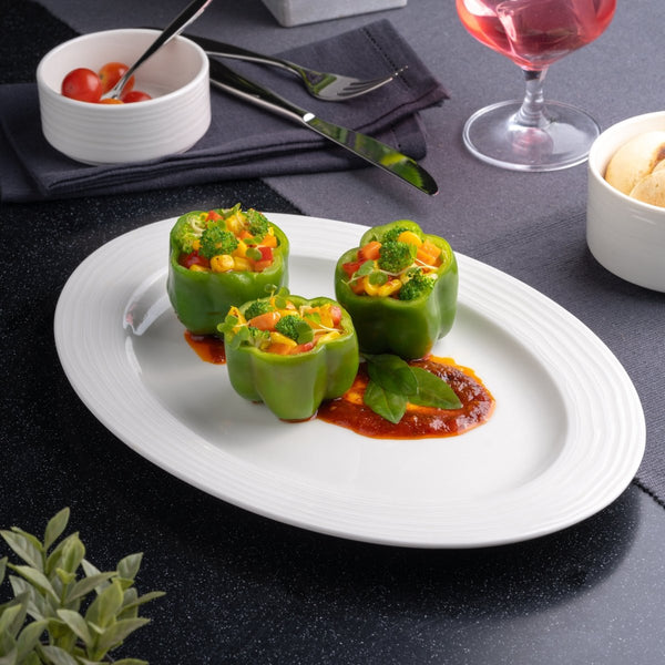 Ariane Prime 12 3/5'' x 8 2/3'' White Eclipse Porcelain Oval Platter - 6/Case (APRARN120015032) - iFoodservice Online