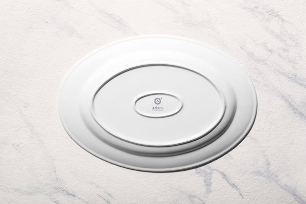 Ariane Prime 14 1/6'' x 10'' Prime - Warm White Porcelain Oval Platter - 6/Case (APRARN000015036) - iFoodservice Online