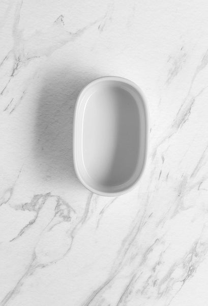 Ariane Prime 3 1/2" x 2" White Orba Porcelain Sugar Pack Holder - 12/Case (APRARN121077001) - iFoodservice Online