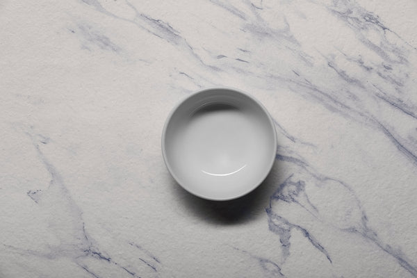 Ariane Prime 4 5/7" White Orba Porcelain Bowl - 12/Case (APRARN121022012) - iFoodservice Online