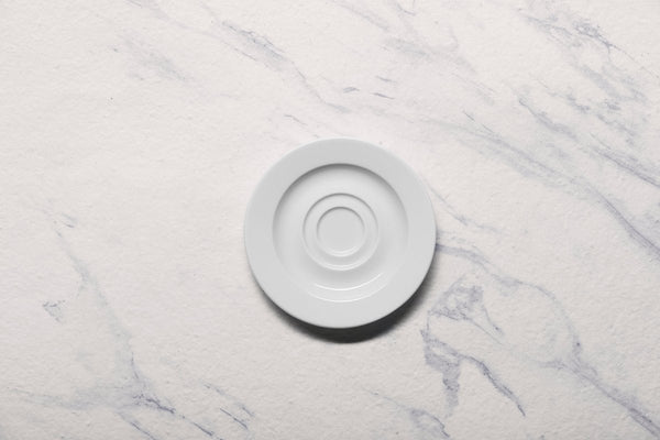 Ariane Prime 5 1/8" Prime - Warm White Porcelain Saucer - 12/Case (APRARN000014013) - iFoodservice Online