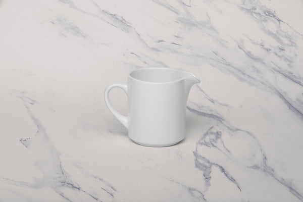 Ariane Prime 5 Oz Prime - Warm White Porcelain Creamer With Handle - 12/Case (APRARN000064015) - iFoodservice Online