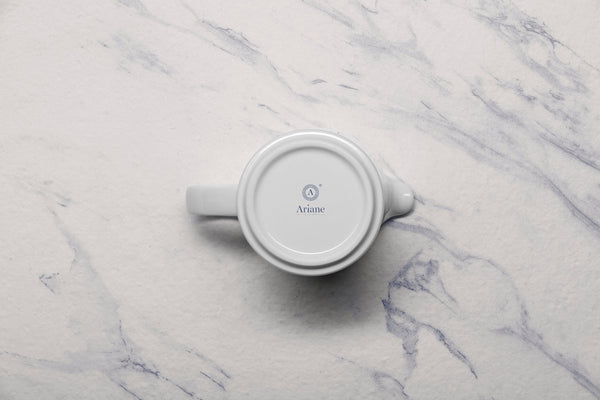 Ariane Prime 5 Oz Prime - Warm White Porcelain Creamer With Handle - 12/Case (APRARN000064015) - iFoodservice Online