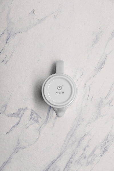 Ariane Prime 5 Oz White Eclipse Porcelain Creamer With Handle - 12/Case (APRARN120064015) - iFoodservice Online