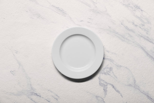 Ariane Prime 6" Prime - Warm White Porcelain Flat Plate - 12/Case (APRARN000011015) - iFoodservice Online