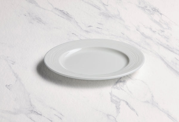 Ariane Prime 7 1/2" White Eclipse Porcelain Flat Plate - 12/Case (APRARN120011019) - iFoodservice Online
