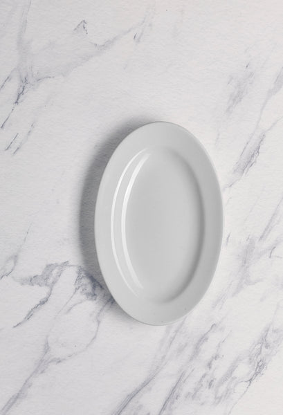 Ariane Prime 8 2/3'' x 6 1/9" Prime - Warm White Porcelain Oval Platter - 12/Case (APRARN000015022) - iFoodservice Online