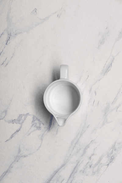 Ariane Prime 8 4/9 Oz Orba White Porcelain Creamer With Handle - 12/Case (APRARN121064025) - iFoodservice Online