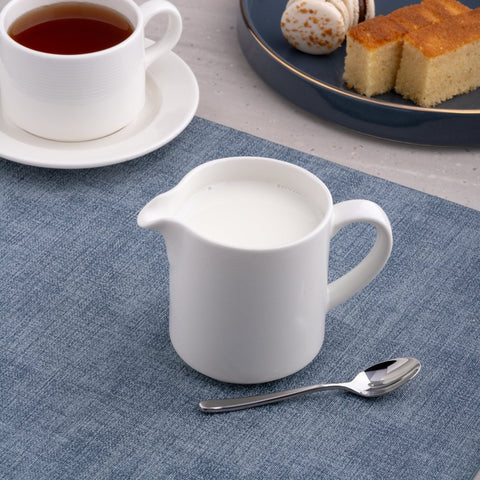 Ariane Prime 8 4/9 Oz Orba White Porcelain Creamer With Handle - 12/Case (APRARN121064025) - iFoodservice Online