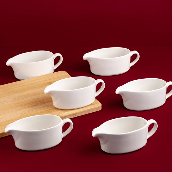 Ariane Prime 8 4/9 Oz Prime - Warm White Porcelain Oval Gravy Boat - 12/Case (APRARN000031025) - iFoodservice Online