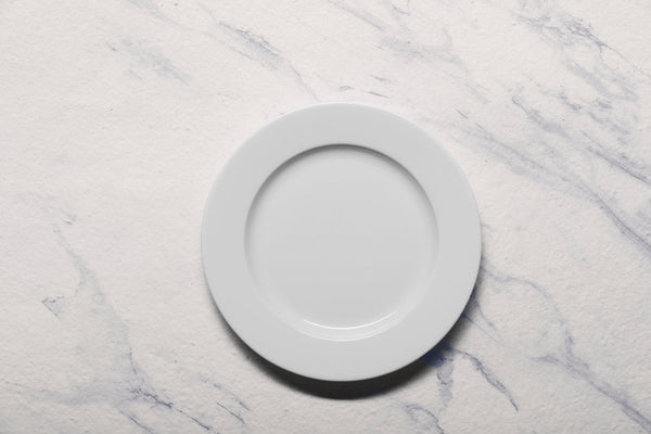 Ariane Prime 9 4/9" Prime - Warm White Porcelain Flat Plate - 12/Case (APRARN000011024) - iFoodservice Online