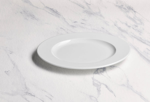 Ariane Prime 9 4/9" White Orba Porcelain Flat Plate - 12/Case (APRARN121011024) - iFoodservice Online