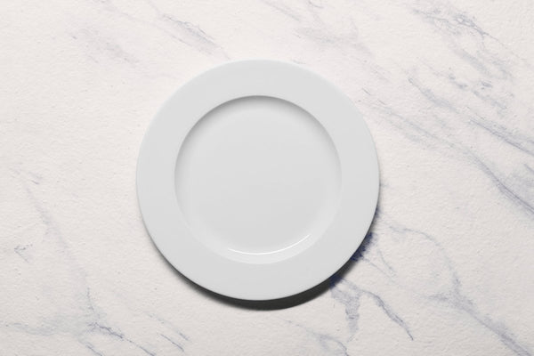 Ariane Prime 9 5/6" Prime - Warm White Porcelain Flat Plate - 12/Case (APRARN000011025) - iFoodservice Online