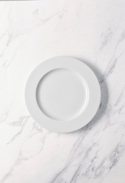 Ariane Prime 9 5/6" White Orba Porcelain Flat Plate - 12/Case (APRARN121011025) - iFoodservice Online