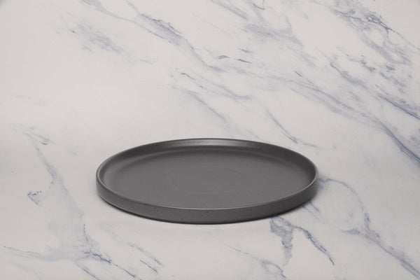 Ariane Selas 9 5/6" Selas - Charcoal Grey Dots Porcelain Short Rim Stackable Plate - 4/Case (ASEARNA05B11025) - iFoodservice Online