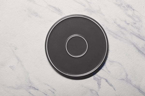 Ariane Selas 9 5/6" Selas - Charcoal Grey Dots Porcelain Short Rim Stackable Plate - 4/Case (ASEARNA05B11025) - iFoodservice Online