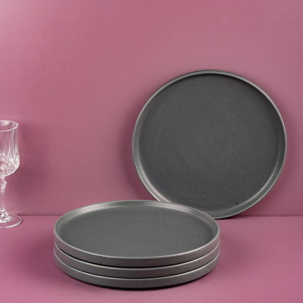 Ariane Selas 9 5/6" Selas - Charcoal Grey Dots Porcelain Short Rim Stackable Plate - 4/Case (ASEARNA05B11025) - iFoodservice Online