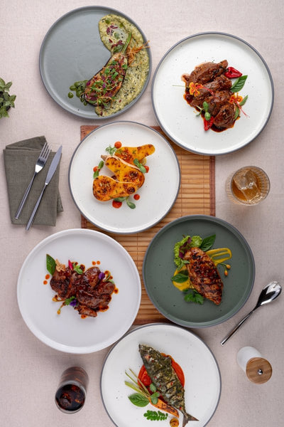 Ariane Selas 9 5/6" Selas - Dark Sand Dots Porcelain Short Rim Stackable Plate - 4/Case (ASEARNA07B11025) - iFoodservice Online