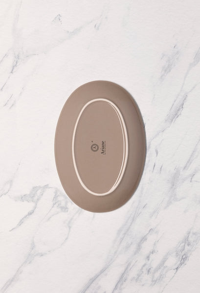 Ariane Vital Coupe 10 1/4" Splash Beige Porcelain Coupe Oval Plate - 12/Case (AVCARN257015026) - iFoodservice Online