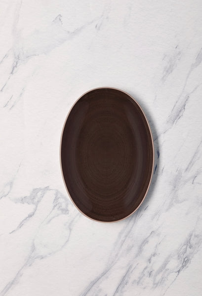 Ariane Vital Coupe 10 1/4" Twister Deep Brown Porcelain Coupe Oval Plate - 12/Case (AVCARN263015026) - iFoodservice Online