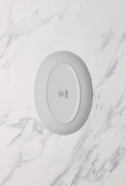 Ariane Vital Coupe 10 1/4" Twister Deep Brown Porcelain Coupe Oval Plate - 12/Case (AVCARN263015026) - iFoodservice Online