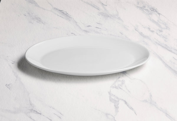 Ariane Vital Coupe 10 1/4" Vital Coupe - Warm White Porcelain Coupe Oval Plate - 12/Case (AVCARN000015026) - iFoodservice Online