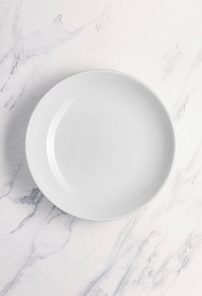 Ariane Vital Coupe 10 1/4" Vital Coupe - Warm White Porcelain Coupe Round Cous Cous Deep Plate - 6/Case (AVCARN000012002) - iFoodservice Online
