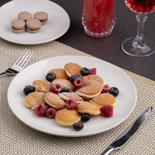 Ariane Vital Coupe 10 5/8" Vital Coupe - Warm White Porcelain Coupe Round Rimless Plate - 6/Case (AVCARN000011027) - iFoodservice Online