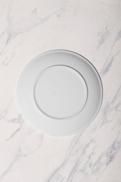 Ariane Vital Coupe 10 5/8" Vital Coupe - Warm White Porcelain Coupe Round Rimless Plate - 6/Case (AVCARN000011027) - iFoodservice Online