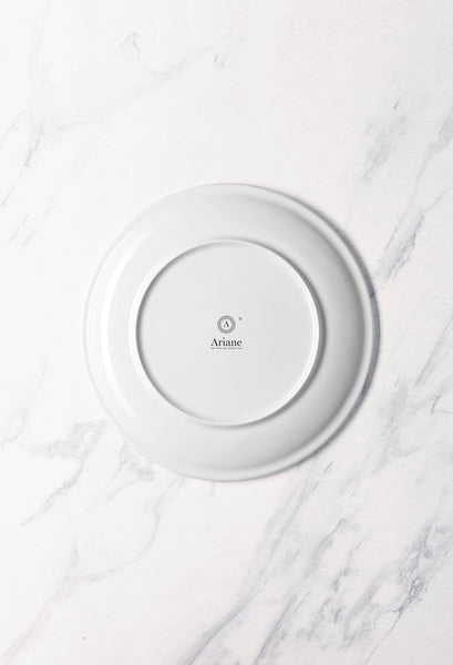 Ariane Vital Coupe 10" Vital Coupe - Warm White Porcelain Coupe Round Rimless Plate - 6/Case (AVCARN000011025) - iFoodservice Online