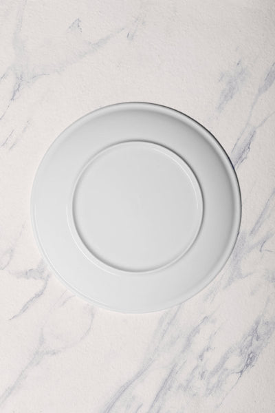 Ariane Vital Coupe 11 3/7" Vital Coupe - Warm White Porcelain Coupe Round Rimless Plate - 6/Case (AVCARN000011029) - iFoodservice Online