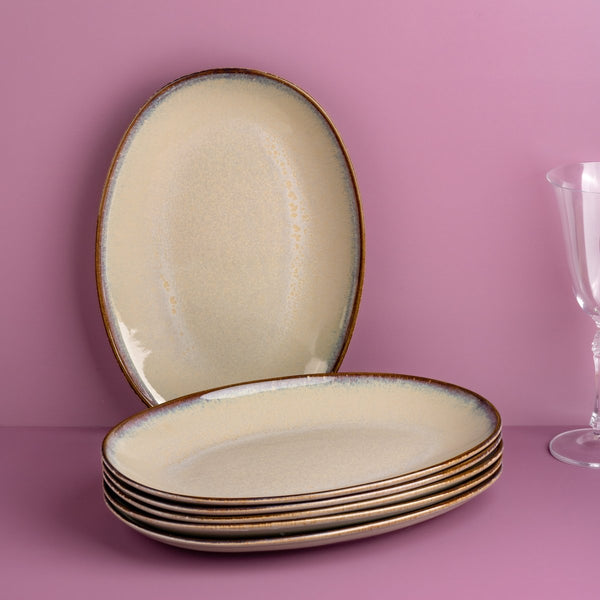 Ariane Vital Coupe 12 3/5" Splash Beige Porcelain Coupe Oval Plate - 6/Case (AVCARN257015032) - iFoodservice Online