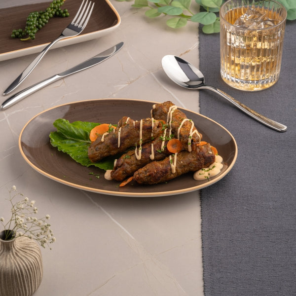 Ariane Vital Coupe 12 3/5" Twister Dark Brown Porcelain Coupe Oval Plate - 6/Case (AVCARN263015032) - iFoodservice Online