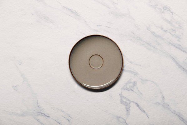 Ariane Vital Coupe 5 1/8" Splash Beige Porcelain Coupe Elevated Espresso Saucer - 12/Case (AVCARN257014013) - iFoodservice Online