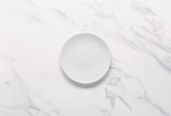 Ariane Vital Coupe 6" Vital Coupe - Warm White Porcelain Coupe Round Rimless Plate - 12/Case (AVCARN000011015) - iFoodservice Online