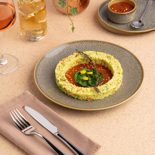 Ariane Vital Coupe 7" Freckles Porcelain Coupe Round Rimless Plate - 12/Case (AVCARNC97011018) - iFoodservice Online