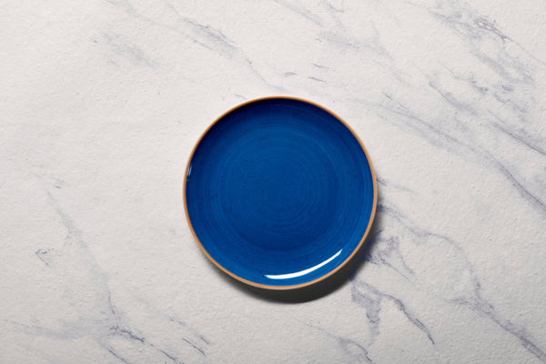 Ariane Vital Coupe 7" Twister Blue Porcelain Coupe Round Rimless Plate - 12/Case (AVCARN264011018) - iFoodservice Online