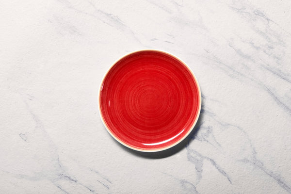 Ariane Vital Coupe 8 1/4" Twister Red Porcelain Coupe Round Rimless Plate - 12/Case (AVCARN204011021) - iFoodservice Online