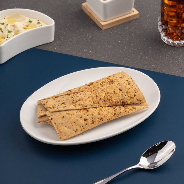 Ariane Vital Coupe 8 1/4" Vital Coupe - Warm White Porcelain Coupe Oval Plate - 12/Case (AVCARN000015021) - iFoodservice Online